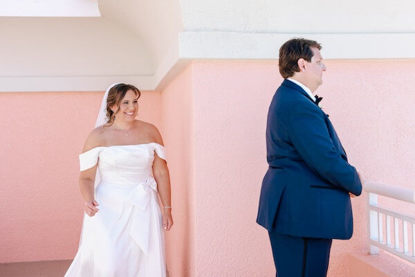 The bride and groom's first look photo session before their Clearwater Beach wedding.