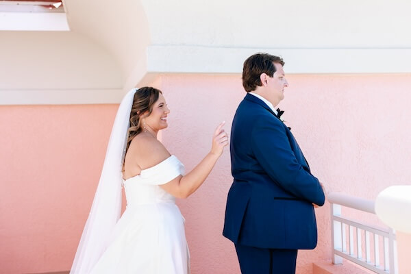 The bride and groom's first look photo session before their Clearwater Beach wedding.