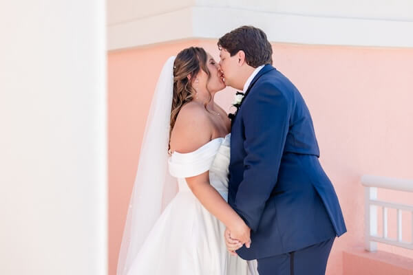 The bride and groom's first look photo session before their Clearwater Beach wedding.