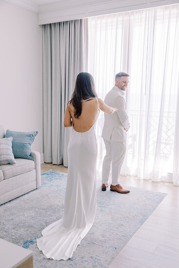 A bride and groom's first look before their Clearwater Beach wedding.