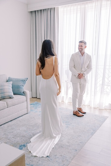 A bride and groom's first look before their Clearwater Beach wedding.