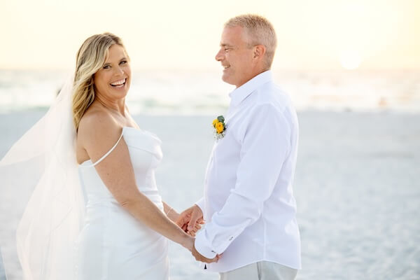 A bride and groom on Clearwater Beach