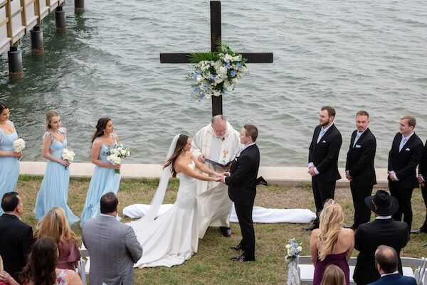 A waterfront wedding ceremony at Tampa Bay Watch.