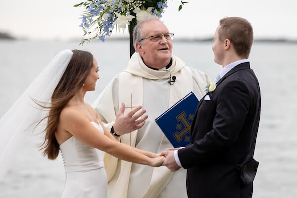 A waterfront wedding ceremony at Tampa Bay Watch.