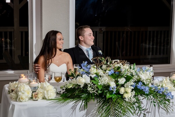 Bride and groom at their sweetheart table.