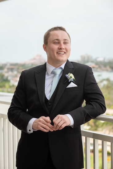 A grrom wait to see his birde beofre their Tampa Bay Watch wedding.