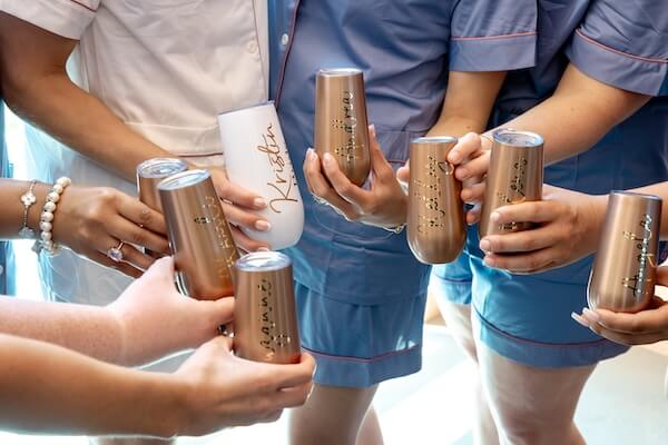 A bride toasting with her wedding party.