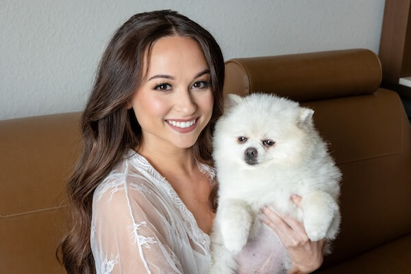 A birde and her puppy before her Tampa Bay Watch wedding.