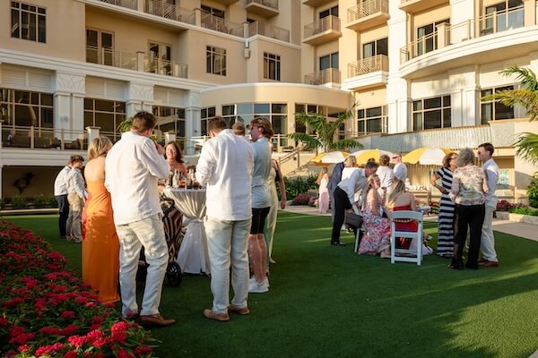 Cocktail hour on the pool lawn at the Sandpearl Resort and Spa.