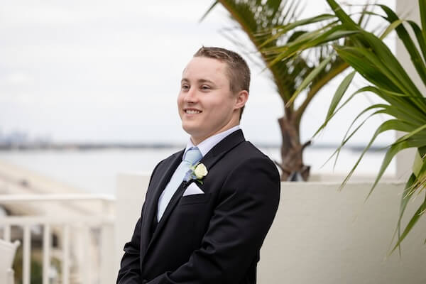 A groom waiting to see his bride-to-be for the first time.