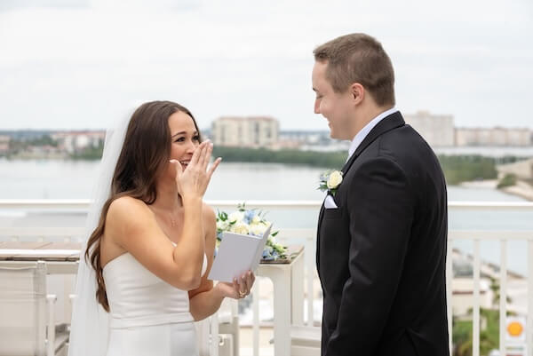 A bride and groom's first look before their Tampa Bay Watch wedding.