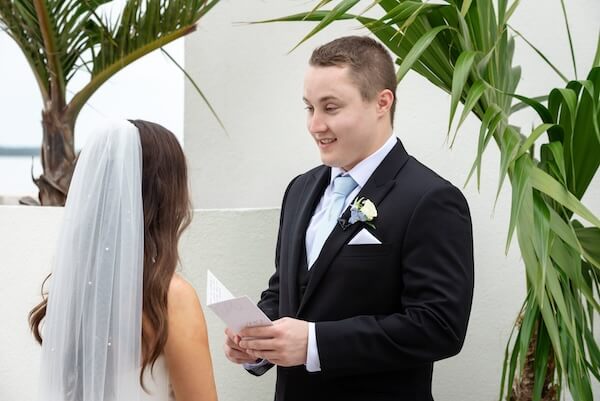 A bride and groom's first look before their Tampa Bay Watch wedding.