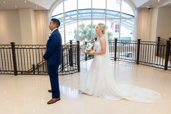 A bride and groom's first look before their Hyatt Regency Clearwater wedding.