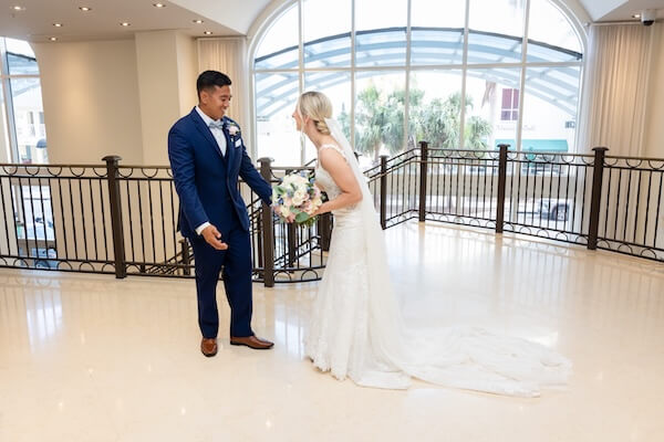 A bride and groom's first look before their Hyatt Regency Clearwater wedding.