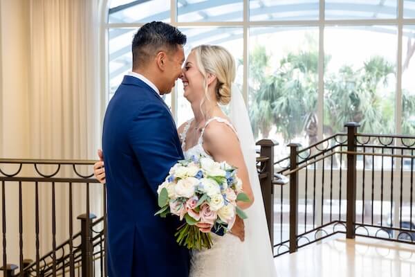 A bride and groom's first look before their Hyatt Regency Clearwater wedding.