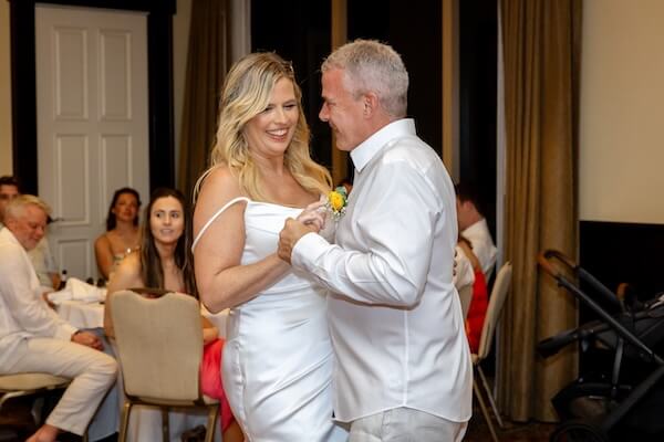 A newlywed couple's first dance to At Last by Etta James.