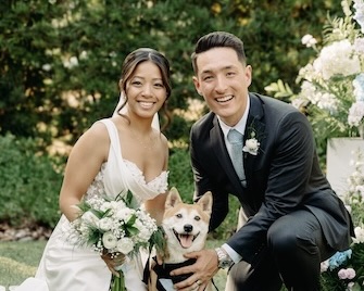 Bride and Groom with thier dog after their Tampa wedding ceremony.