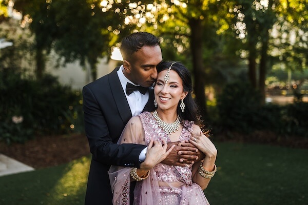 A newlywed couple's portraits after their Tampa Garden Club wedding ceremony.