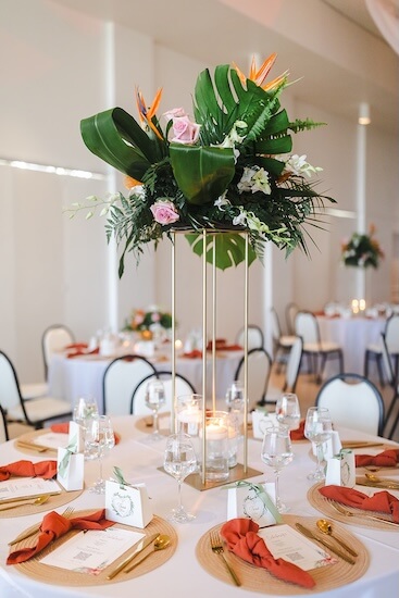 Tropical inspired wedding decor at a Tampa Garden Club wedding reception.