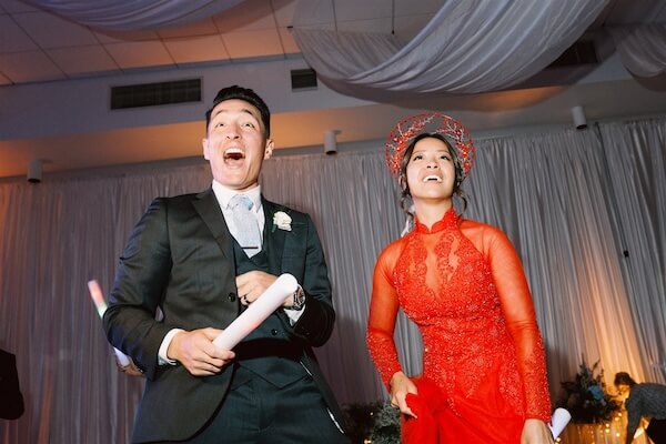Asian bride and groom partying at their Tampa wedding.