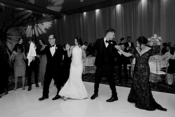 Traditional Albanian dancing at an Opal Sands wedding reception.