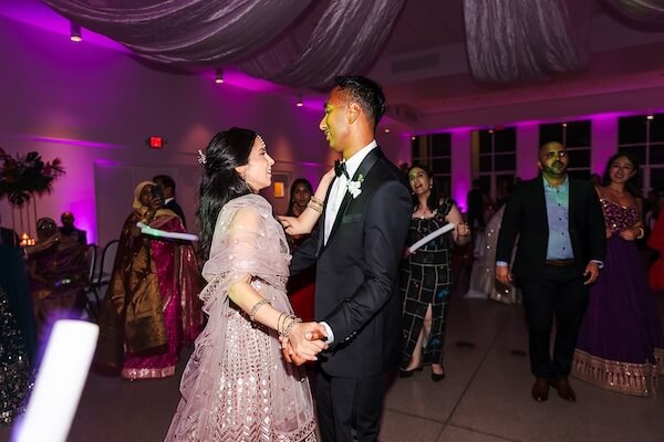 A newlywed couple dancing the night away at their Tampa Garden Club wedding reception.