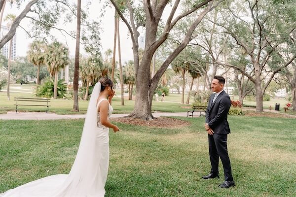 A bride and groom's first look before their Tampa wedding.