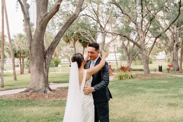 A bride and groom's first look before their Tampa wedding.