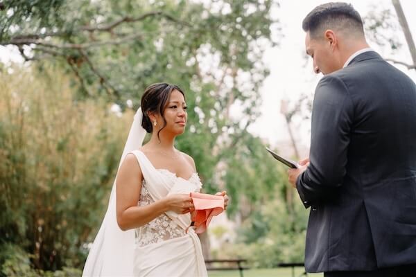 A bride and groom exchange vows in private before their Tampa wedding.