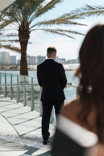 A bride and groom's first look before their Opal Sands wedding ceremony.