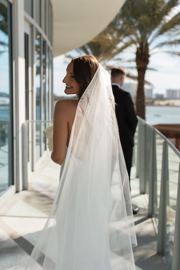 A bride and groom's first look before their Opal Sands wedding ceremony.