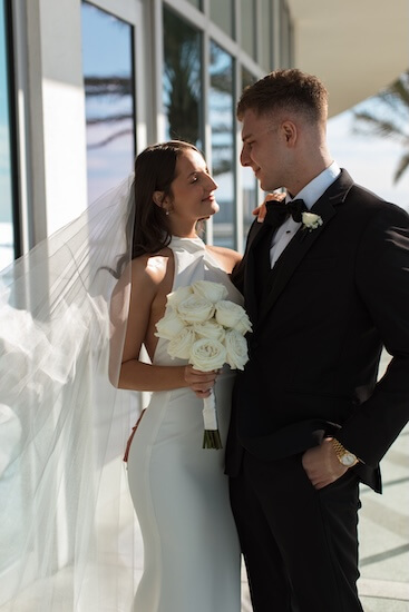 A bride and groom's first look before their Opal Sands wedding ceremony.