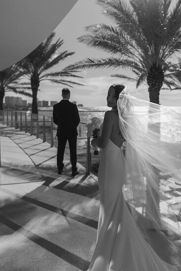 A bride and groom's first look before their Opal Sands wedding ceremony.