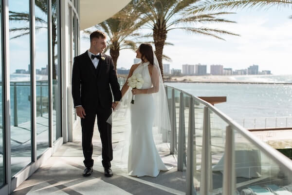 A bride and groom's first look before their Opal Sands wedding ceremony.