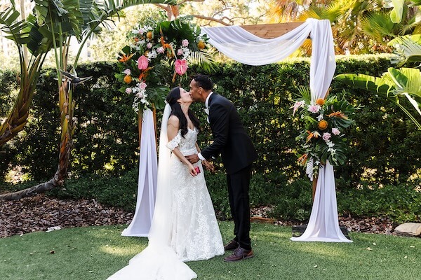 A birde and groom's first kiss.