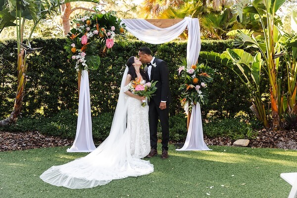 A bride and groom's Tampa Garden Club wedding portraits.