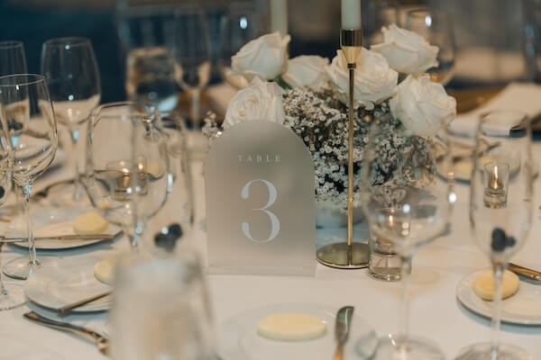 Beautiful white and gold wedding reception decor.