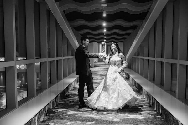 Bride and groom dancing in the hotels hallway during their Clearwater wedding.