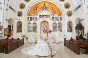 A bride and groom after the wedding ceremony at St. Nicholas Greek Orthodox Church in Tarpon Springs, Florida.