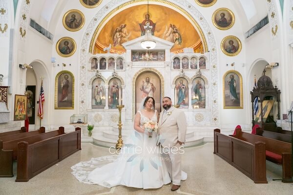 A bride and groom after the wedding ceremony at St. Nicholas Greek Orthodox Church in Tarpon Springs, Florida.