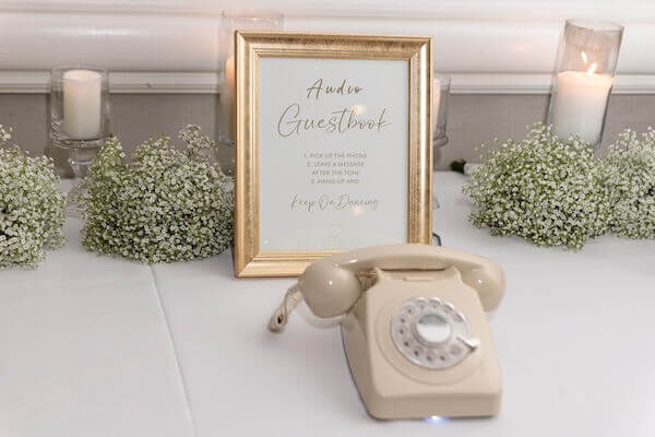 infusing your wedding with retro elementslike a vintage phone guest book is a 2026 wedding trend.