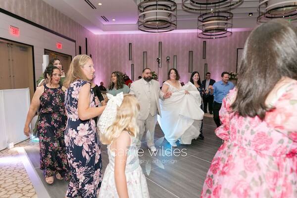 A newlywed couple dancing during thier Wyndham Grand Clearwater Beach wedding reception.