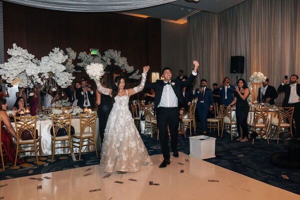 Bride and groom's grand entrance at thier Clearwater wedding reception.