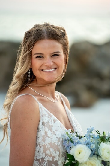 An beautiful bride on Clearwater Beach after her Opal Sands wedding.