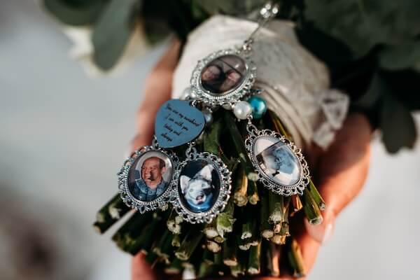 A bridal bouquet with lots of lockets with special mean.