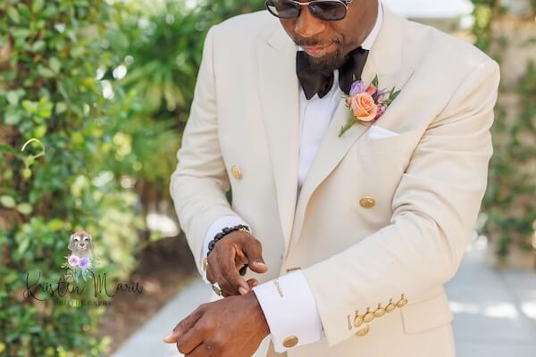 A Tampa groom dressing for his wedding.
