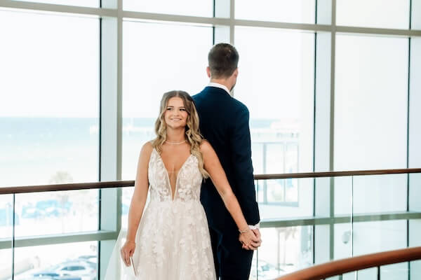 A bride and groom's first look and private wedding vows.