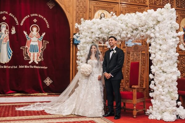 A bride and groom during their St. Mary and St. Mina Coptic Orthodox Church wedding.