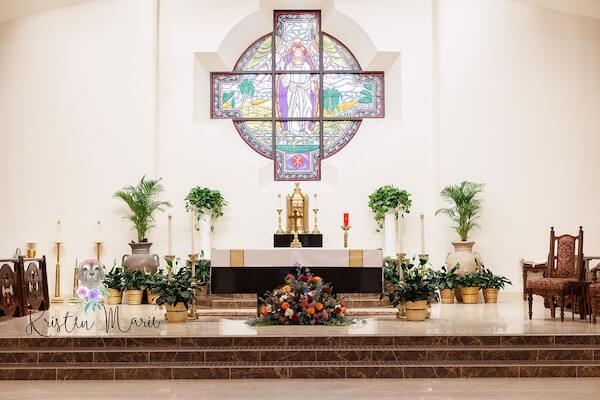 Wedding decor inside Christ the King Catholic Church in Tampa.