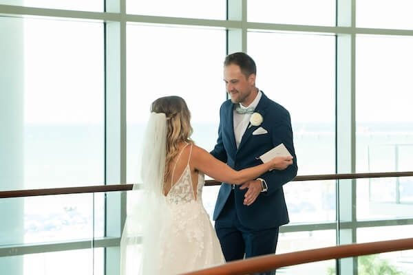 A bride and groom's first look and private wedding vows.